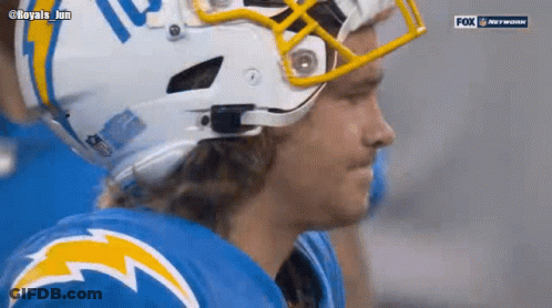 A Close Up Of A Football Player Wearing A Helmet GIF