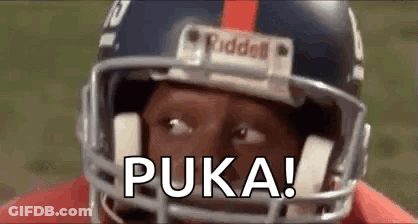 A Close Up Of A Football Player Wearing A Helmet With The Word Puka Written On It . GIF