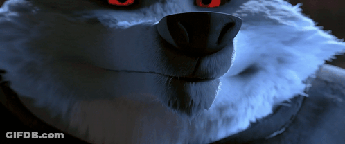 A Close Up Of A Furry Animal 'S Face With Red Eyes GIF