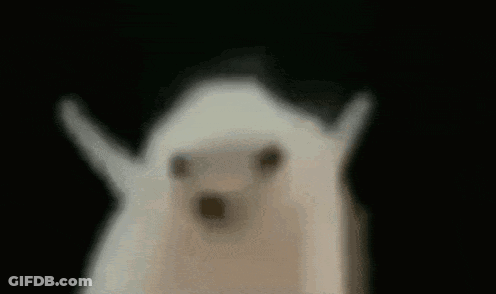 Ghost With Outstretched Arms In Dark GIF