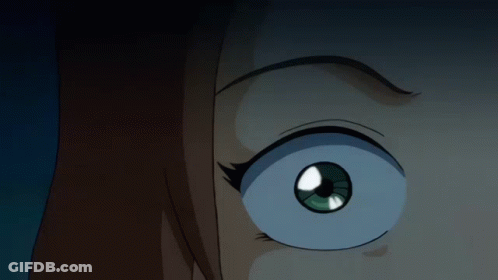 A Close Up Of A Girl 'S Eye With A Blue Pupil GIF