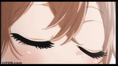 A Close Up Of A Girl 'S Eyes With A Very Long Eyelash GIF
