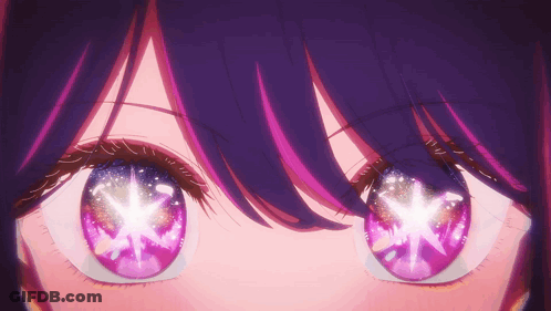 A Close Up Of A Girl 'S Eyes With Purple And Pink Highlights GIF