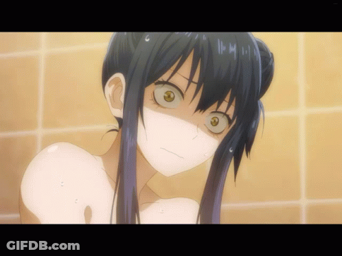 A Close Up Of A Girl 'S Face In A Bathtub With A Yellow Tile Background GIF