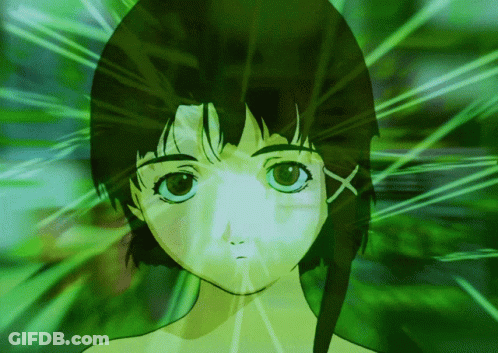 A Close Up Of A Girl 'S Face Surrounded By Green Light GIF