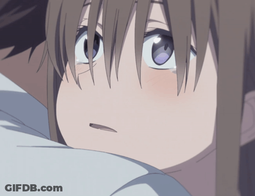 A Close Up Of A Girl 'S Face With A Blue Eye GIF
