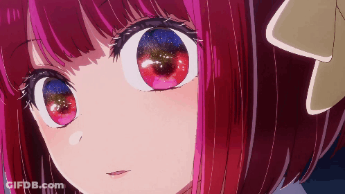 A Close Up Of A Girl 'S Face With A Galaxy In Her Eyes GIF