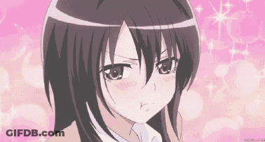 A Close Up Of A Girl 'S Face With A Pink Background Behind Her . GIF
