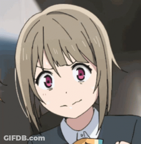 A Close Up Of A Girl 'S Face With A Pink Eye GIF