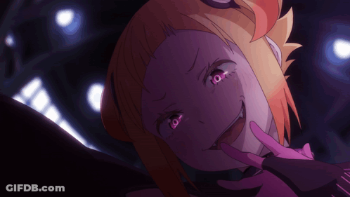 A Close Up Of A Girl 'S Face With A Purple Background GIF