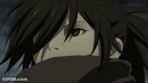 A Close Up Of A Girl 'S Face With A Scarf Around Her Neck GIF