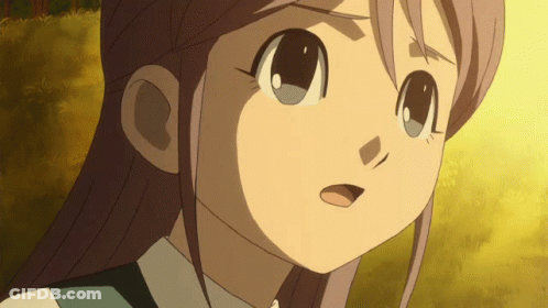 A Close Up Of A Girl 'S Face With A Serious Expression GIF