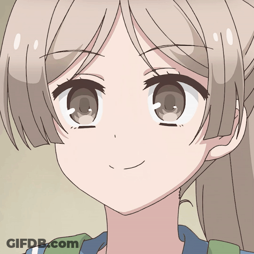 A Close Up Of A Girl 'S Face With A Smiling Expression GIF
