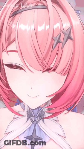A Close Up Of A Girl 'S Face With A Star On Her Hair GIF