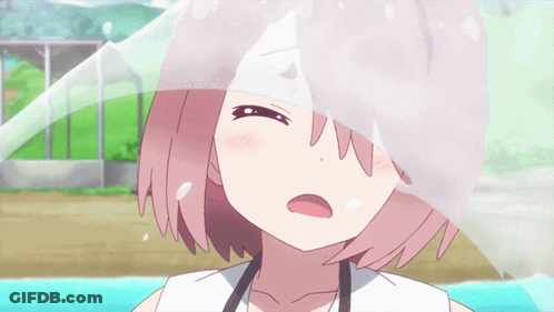 A Close Up Of A Girl 'S Face With A White Cloth Covering Her Face GIF
