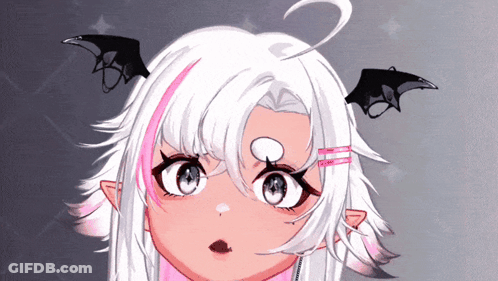 A Close Up Of A Girl 'S Face With Bat Wings On Her Ears GIF