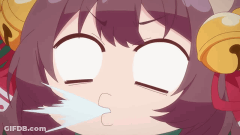 A Close Up Of A Girl 'S Face With Bells On Her Ears Making A Funny Face GIF