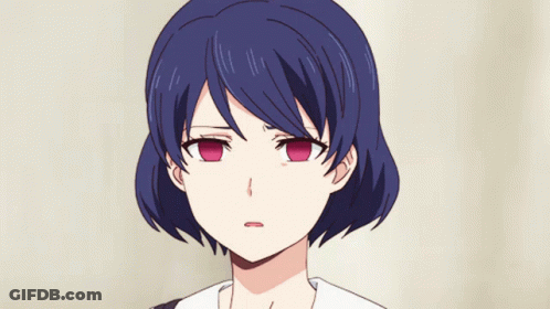 A Close Up Of A Girl 'S Face With Blue Hair And Pink Eyes GIF