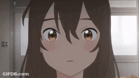 A Close Up Of A Girl 'S Face With Brown Eyes And Long Hair GIF