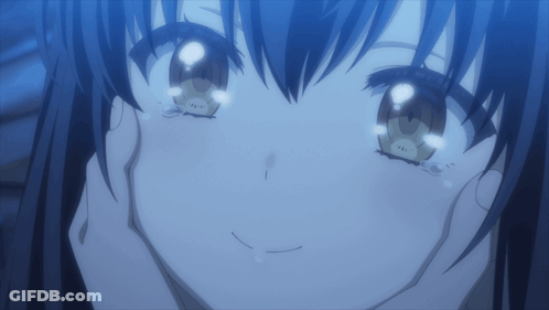 A Close Up Of A Girl 'S Face With Her Eyes Closed GIF
