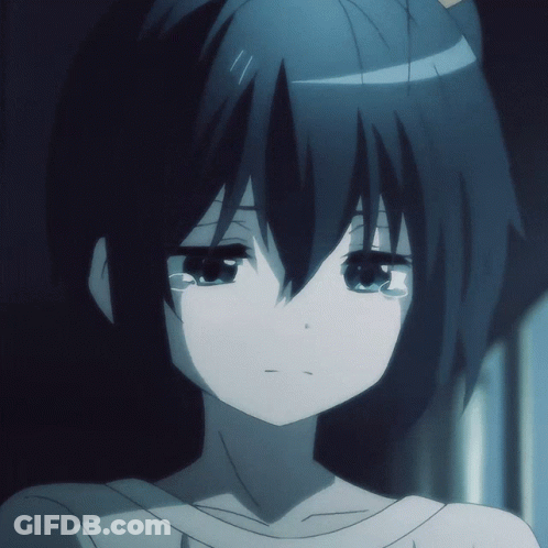 A Close Up Of A Girl 'S Face With Her Eyes Closed GIF