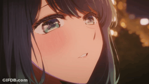 A Close Up Of A Girl 'S Face With Her Mouth Open GIF