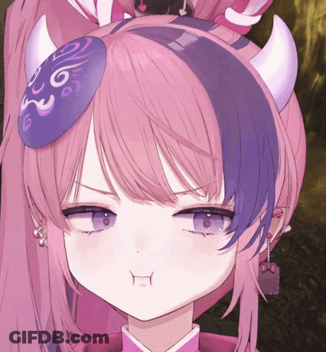 A Close Up Of A Girl 'S Face With Horns And Purple Hair GIF
