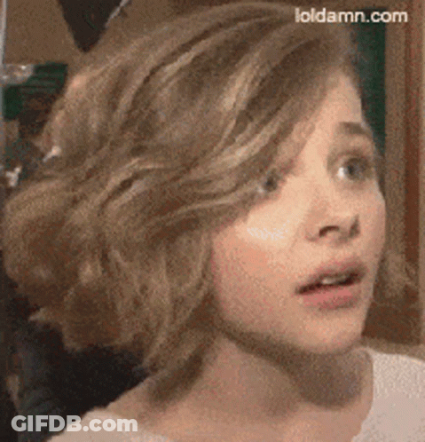 A Close Up Of A Girl 'S Face With Loldamn.com Written On The Bottom Right GIF