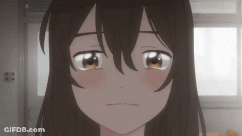 A Close Up Of A Girl 'S Face With Long Brown Hair GIF