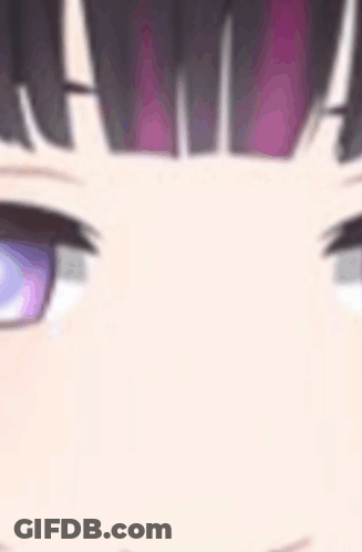 A Close Up Of A Girl 'S Face With Purple Eyes And A Purple Fringe . GIF