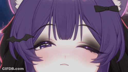 A Close Up Of A Girl 'S Face With Purple Hair And A Bat On Her Head GIF