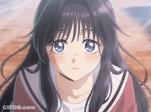 A Close Up Of A Girl 'S Face With Purple Hair And Blue Eyes GIF