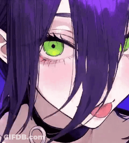 A Close Up Of A Girl 'S Face With Purple Hair And Green Eyes . GIF