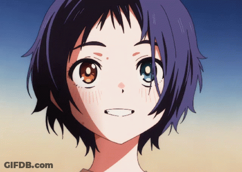 A Close Up Of A Girl 'S Face With Purple Hair GIF