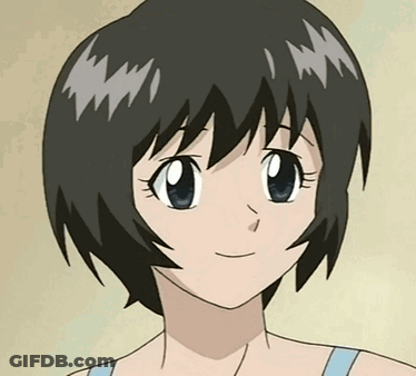 A Close Up Of A Girl 'S Face With Short Hair GIF