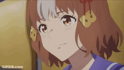 A Close Up Of A Girl 'S Face With The Letter B On Her Head GIF