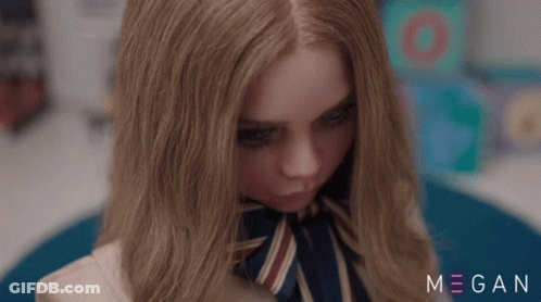 A Close Up Of A Girl 'S Face With The Name Megan On The Bottom Right GIF