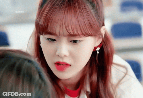 A Close Up Of A Girl 'S Face With The Word Ching On The Bottom Left GIF