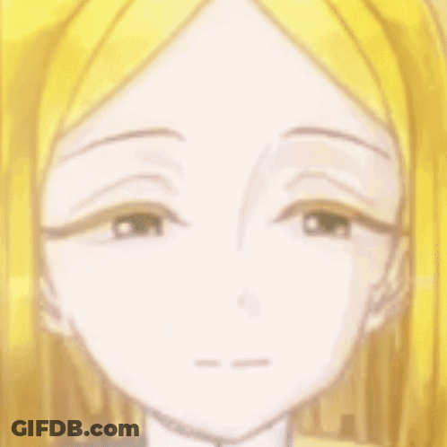 A Close Up Of A Girl 'S Face With Yellow Hair And A Sad Look On Her Face . GIF