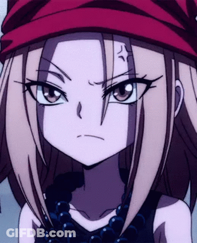 A Close Up Of A Girl Wearing A Red Hat And A Necklace GIF