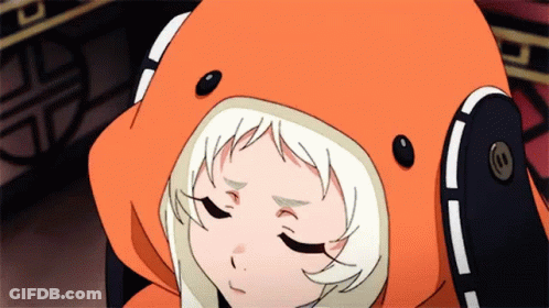 A Close Up Of A Girl Wearing An Orange Hoodie With Headphones On Her Head . GIF