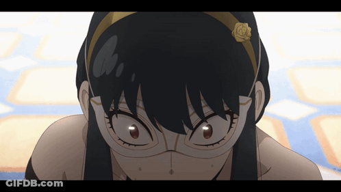 A Close Up Of A Girl Wearing Glasses And A Headband With A Flower On It GIF