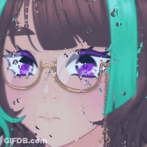 A Close Up Of A Girl Wearing Glasses And Purple Eyes GIF
