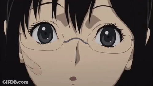 A Close Up Of A Girl Wearing Glasses Looking At The Camera GIF