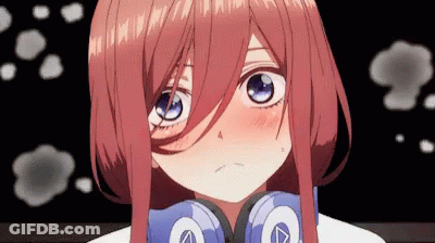 A Close Up Of A Girl Wearing Headphones With A Letter A On Them GIF