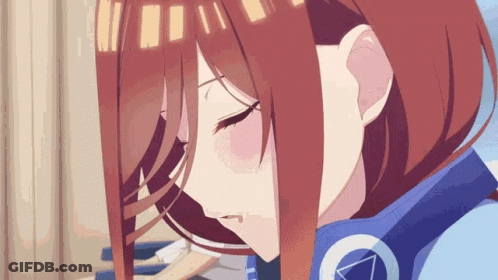 A Close Up Of A Girl Wearing Headphones With The Number 7 On It GIF
