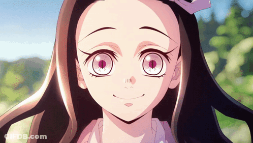 A Close Up Of A Girl With A Bow In Her Hair GIF