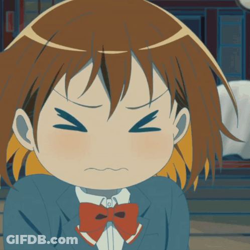 A Close Up Of A Girl With A Bow Tie Making A Funny Face GIF