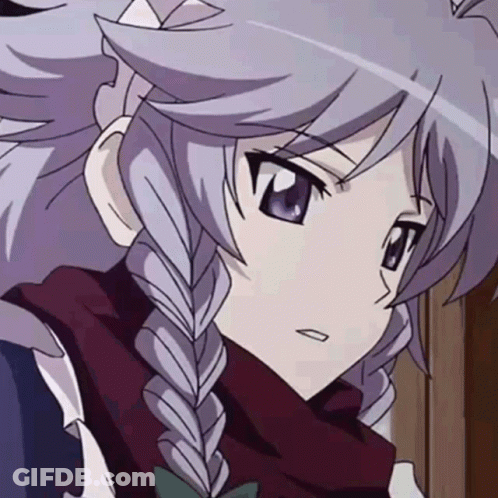 A Close Up Of A Girl With A Braided Hair Style GIF