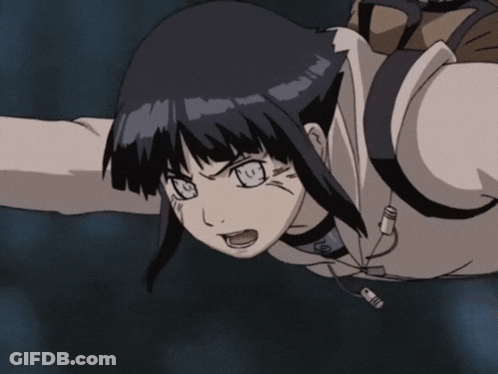 A Close Up Of A Girl With A Yellow Circle With A Flame On It GIF